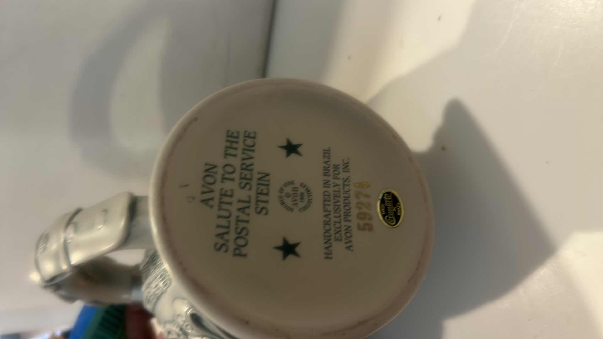 View 5 of AVON CERAMIC BEER STEIN, TITLED "SALUTE TO THE POSTAL SERVICE." H9.5”