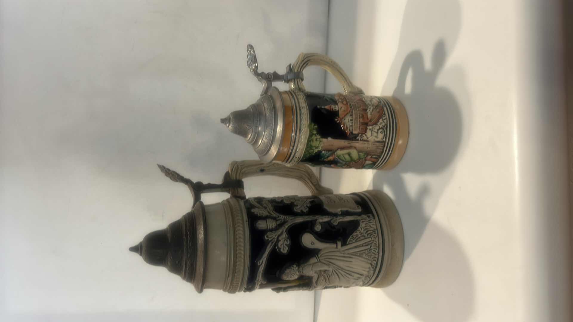 Photo 1 of 2 VINTAGE TRADITIONAL GERMAN CERAMIC BEER STEINS (TALLEST 9.25”)