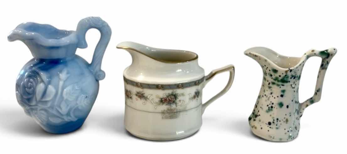 Photo 1 of BLUE SLAG GLASS ROSE PITCHER, PORCELAIN FLORAL CREAMER, & SPATTERWARE ART POTTERY PITCHER H4.5” $65