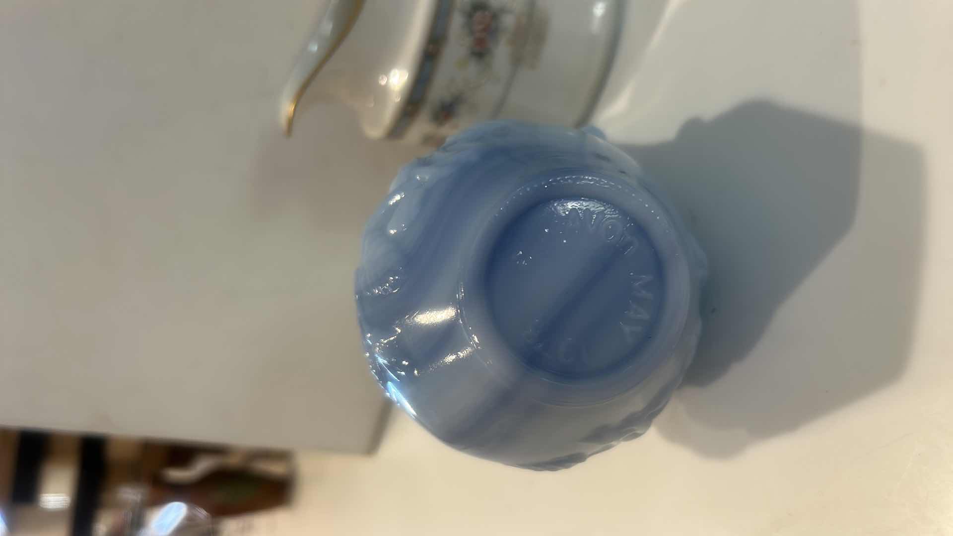 Photo 1 of BLUE SLAG GLASS ROSE PITCHER, PORCELAIN FLORAL CREAMER, & SPATTERWARE ART POTTERY PITCHER H4.5” $65