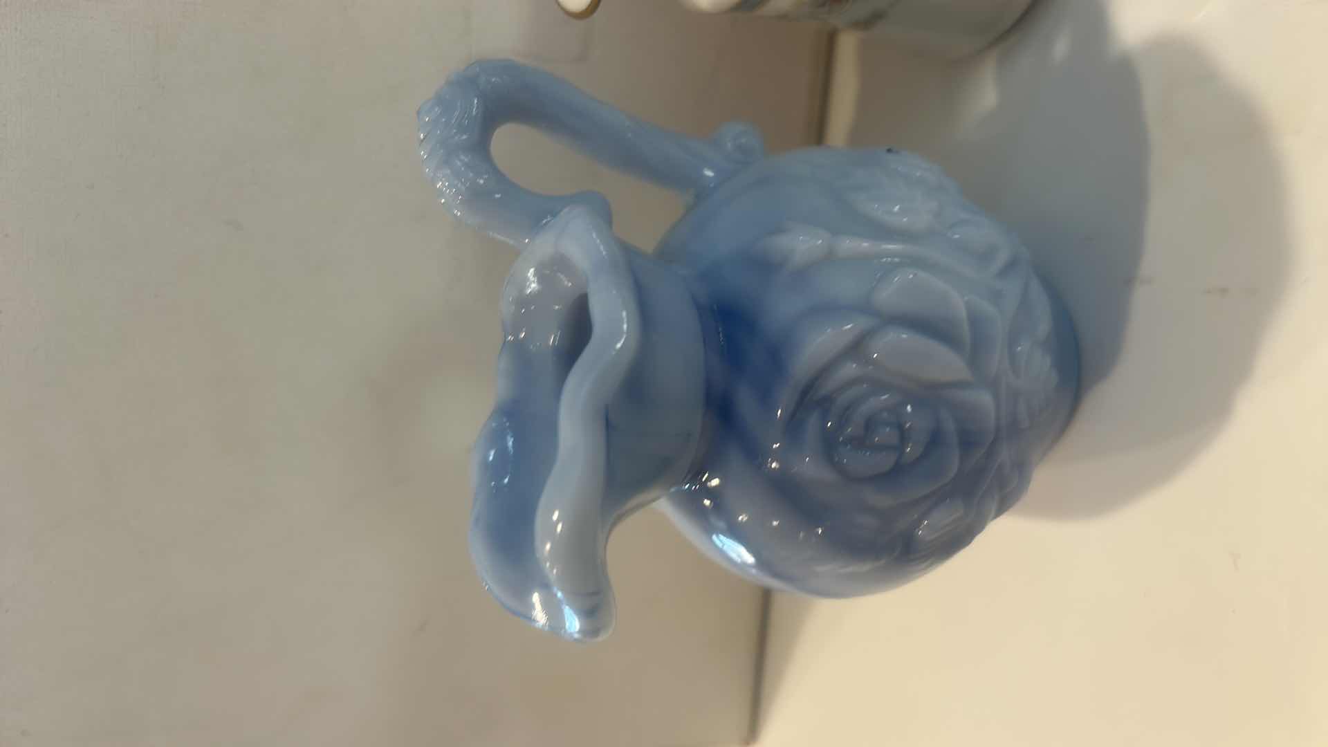 Photo 1 of BLUE SLAG GLASS ROSE PITCHER, PORCELAIN FLORAL CREAMER, & SPATTERWARE ART POTTERY PITCHER H4.5” $65