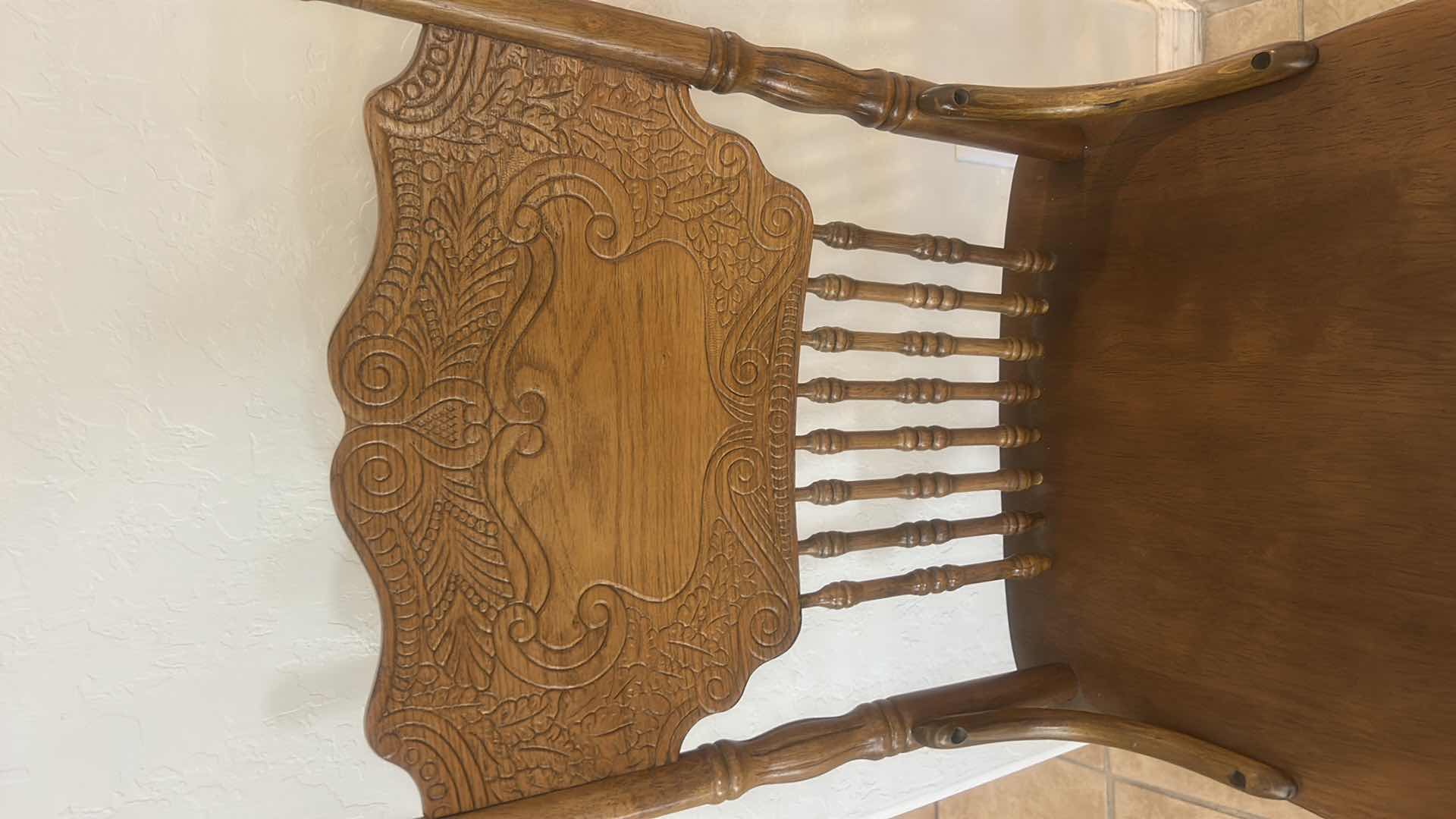 Photo 1 of VINTAGE OAK SWIVEL BARSTOOL WITH ORNATE PRESSBACK CARVED DESIGN ON BACKREST 17“ x 16“ x H42“ SEAT HEIGHT 24”