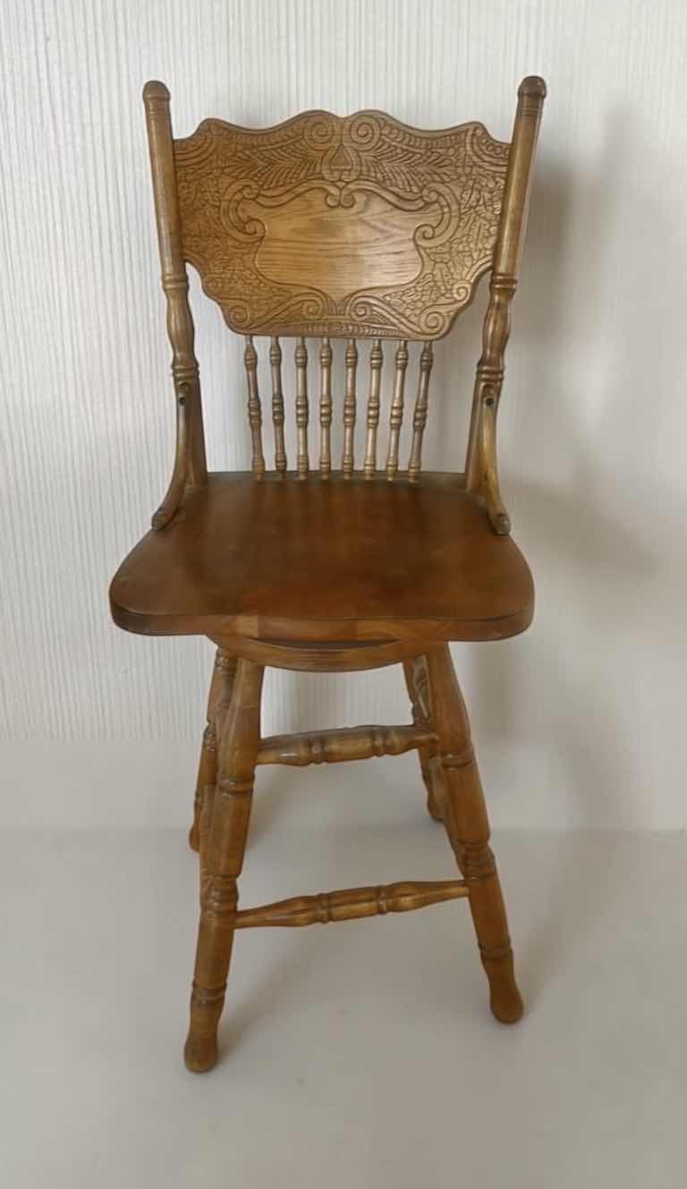 Photo 1 of VINTAGE OAK SWIVEL BARSTOOL WITH ORNATE PRESSBACK CARVED DESIGN ON BACKREST 17“ x 16“ x H42“ SEAT HEIGHT 24”