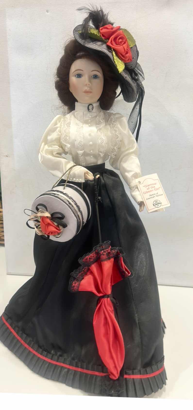 Photo 1 of COLLECTIBLE PORCELAIN DOLL $45
