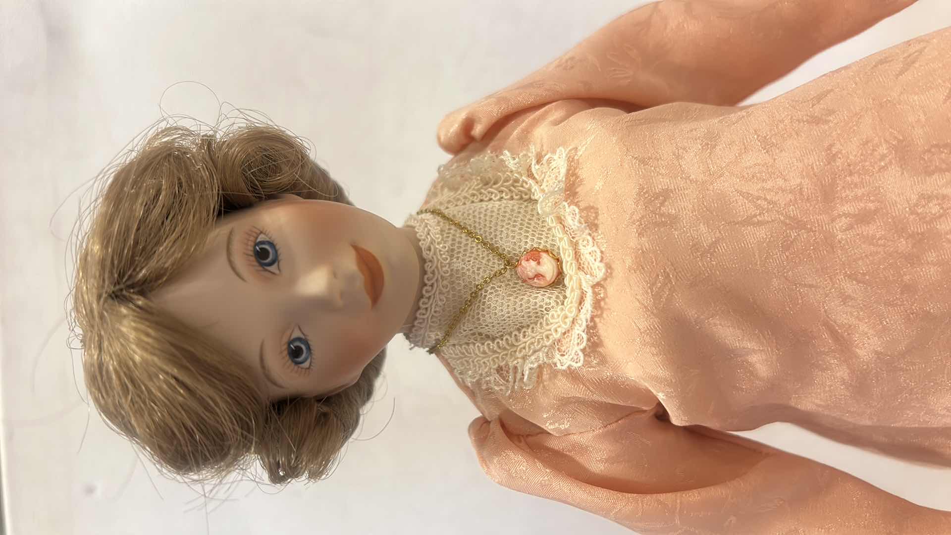Photo 1 of COLLECTIBLE PORCELAIN DOLL H17”
H 17” $45