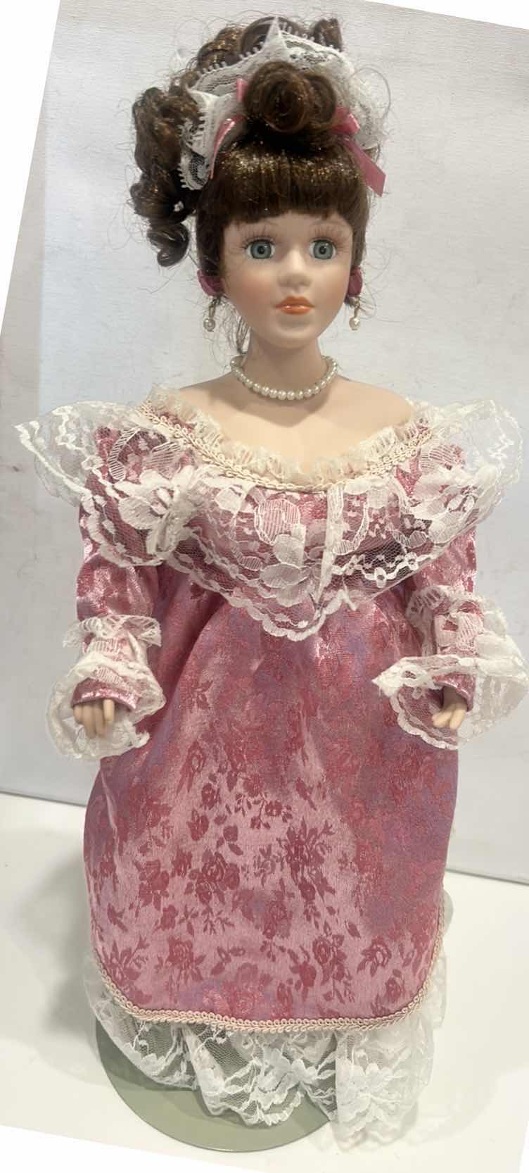 Photo 1 of PORCELAIN COLLECTIBLE DOLL H19”