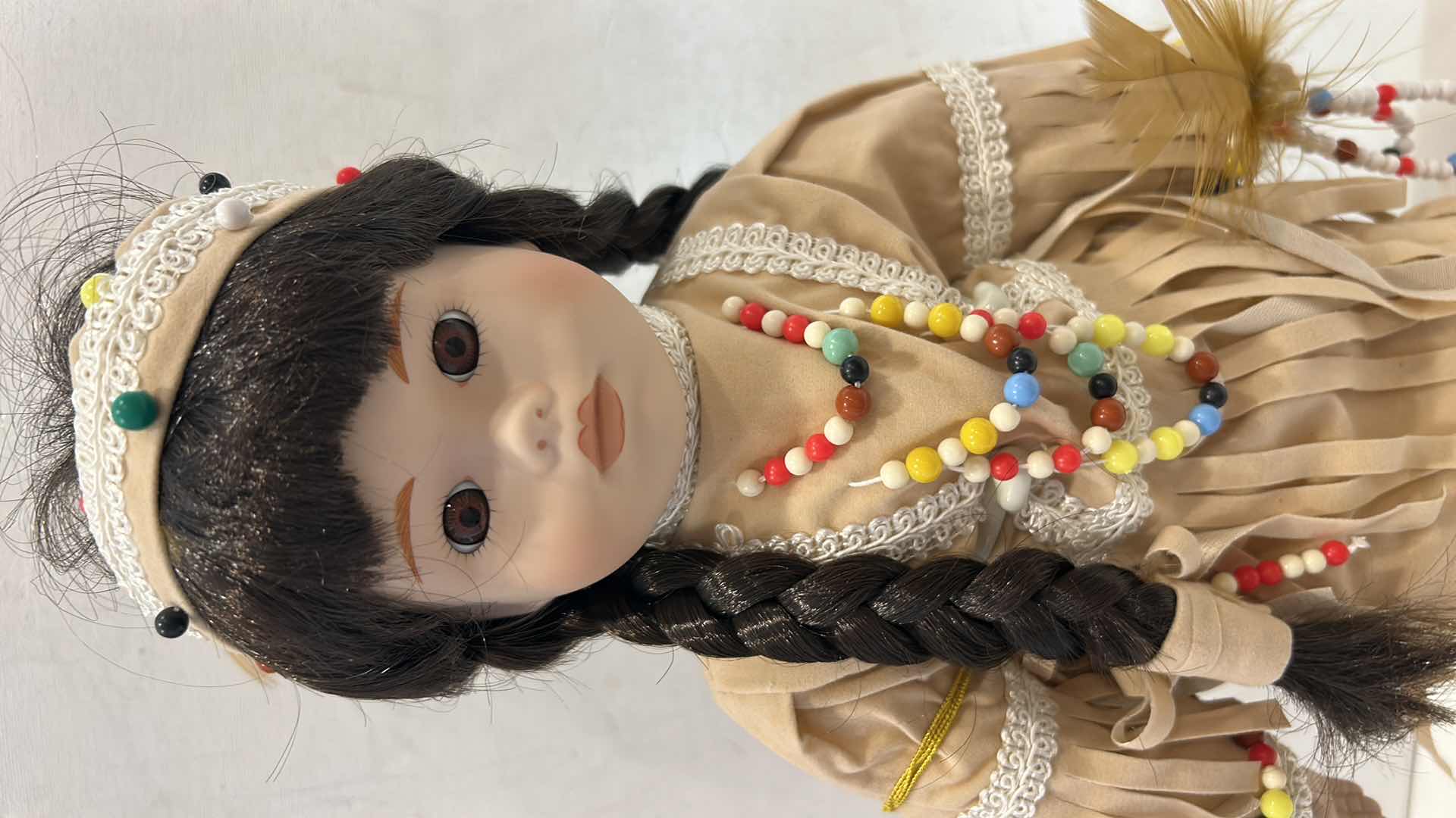 Photo 1 of LITTLE INDIAN PORCELAIN DOLL H17”