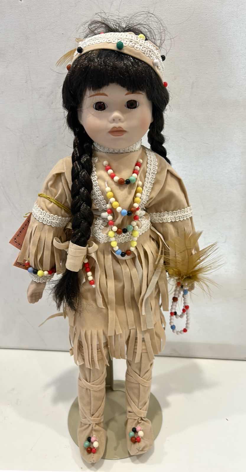 Photo 1 of LITTLE INDIAN PORCELAIN DOLL H17”