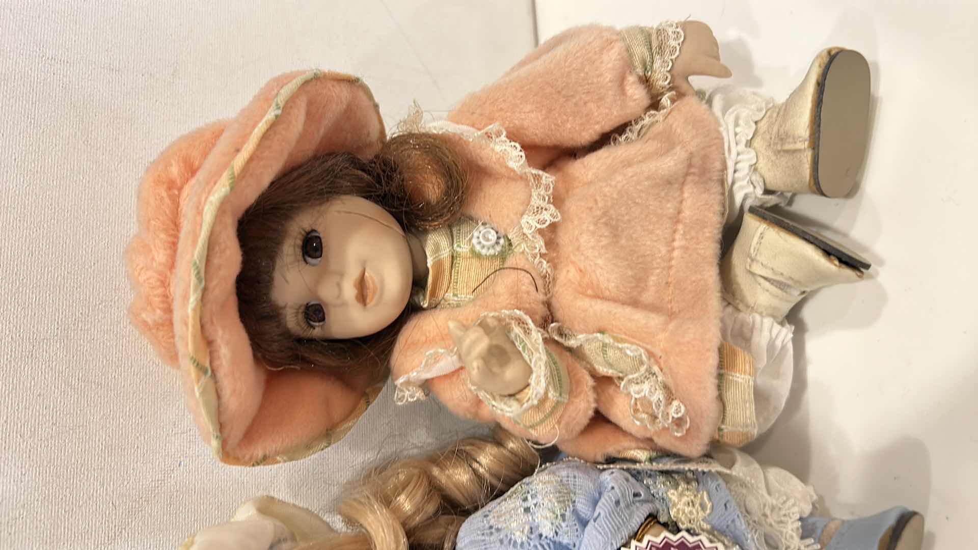 Photo 1 of 3 PORCELAIN DOLLS H8”