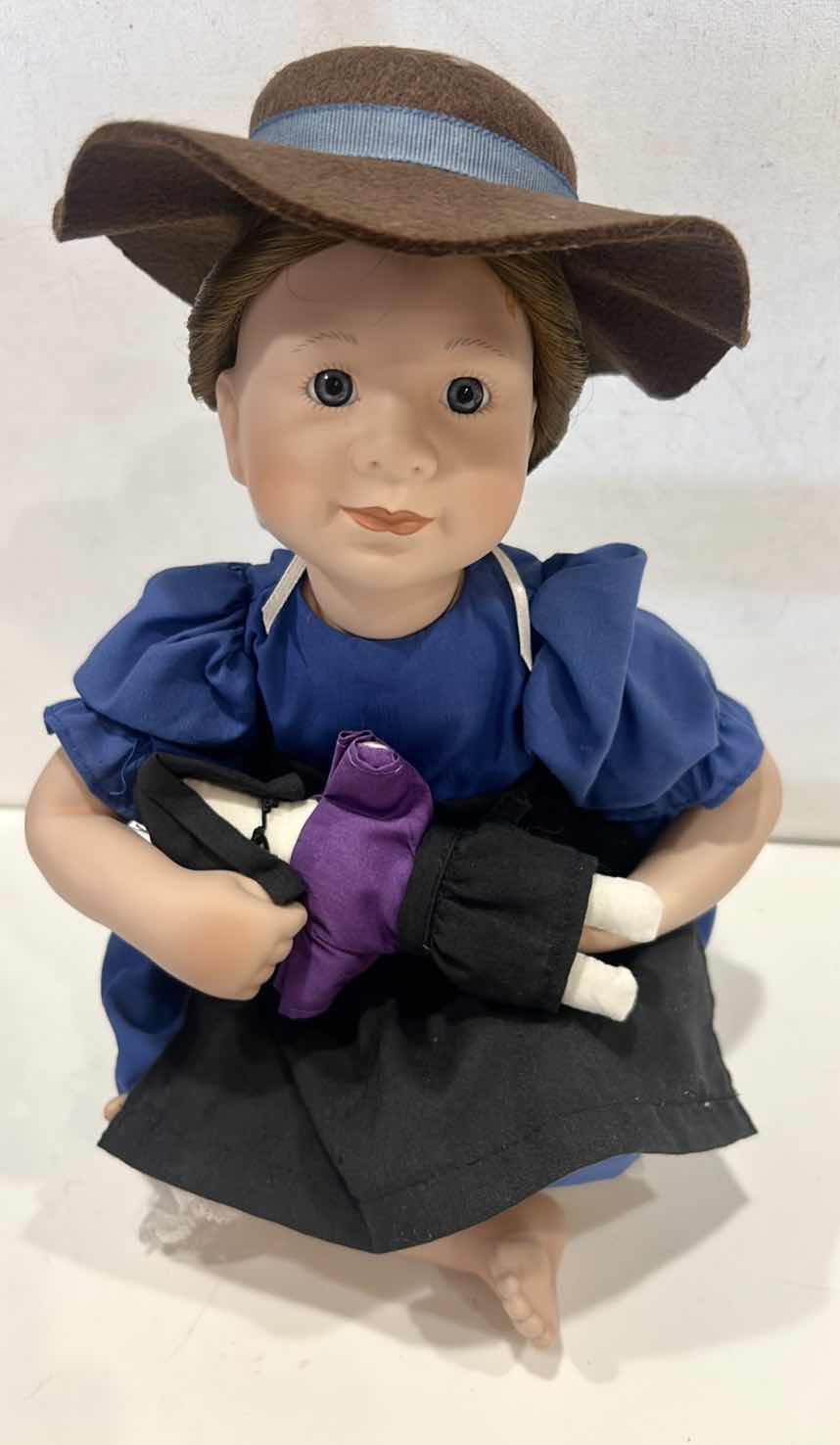 Photo 1 of ASHTON-DRAKE GALLERIES PORCELAIN BABY DOLL DESIGNED BY ARTIST YOLANDA BELLO. H 10”