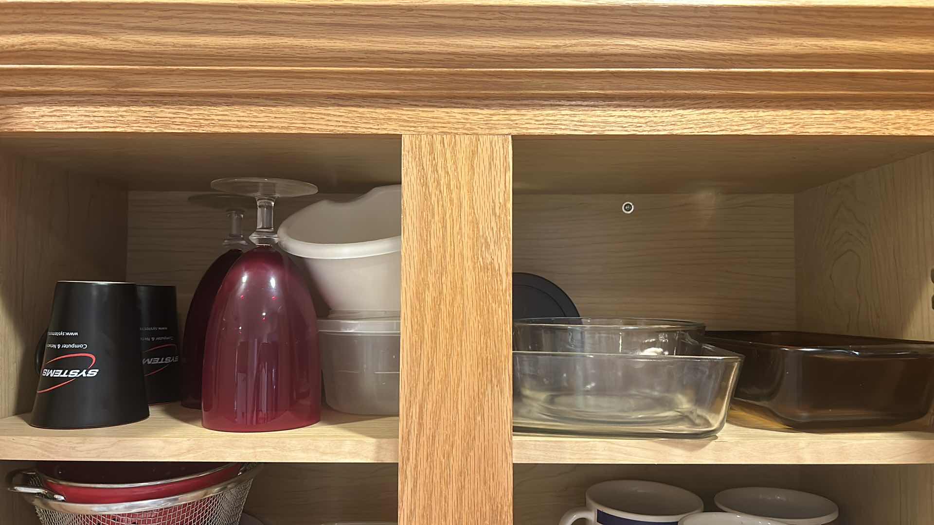 Photo 1 of CONTENTS OF CABINET IN KITCHEN