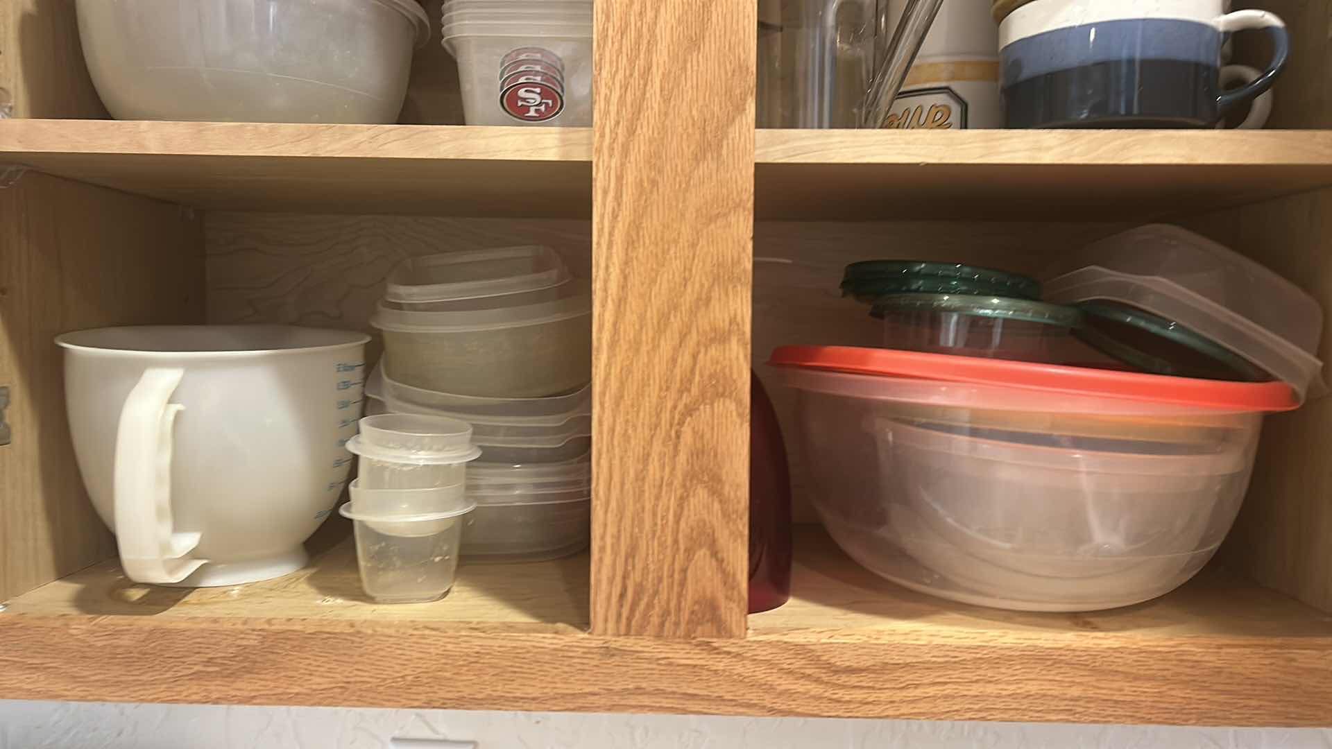 Photo 1 of CONTENTS OF CABINET IN KITCHEN