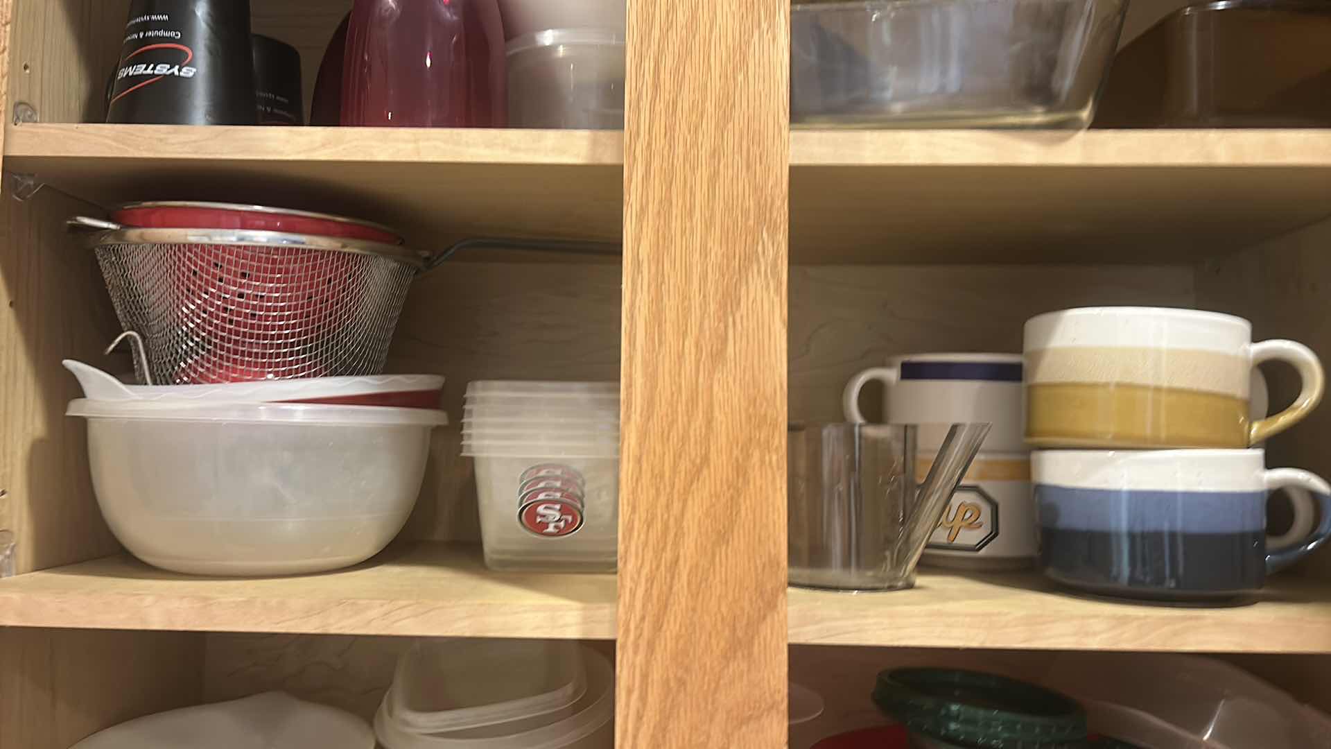 Photo 1 of CONTENTS OF CABINET IN KITCHEN
