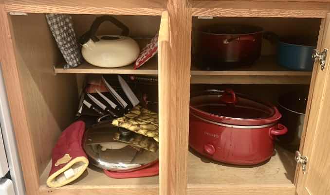 Photo 1 of CONTENTS OF CABINET IN KITCHEN