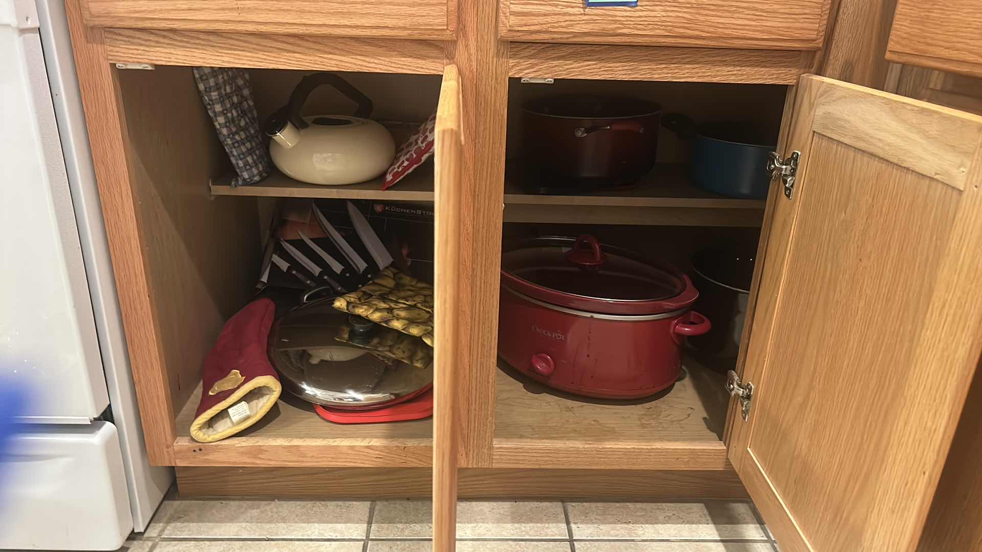 Photo 1 of CONTENTS OF CABINET IN KITCHEN