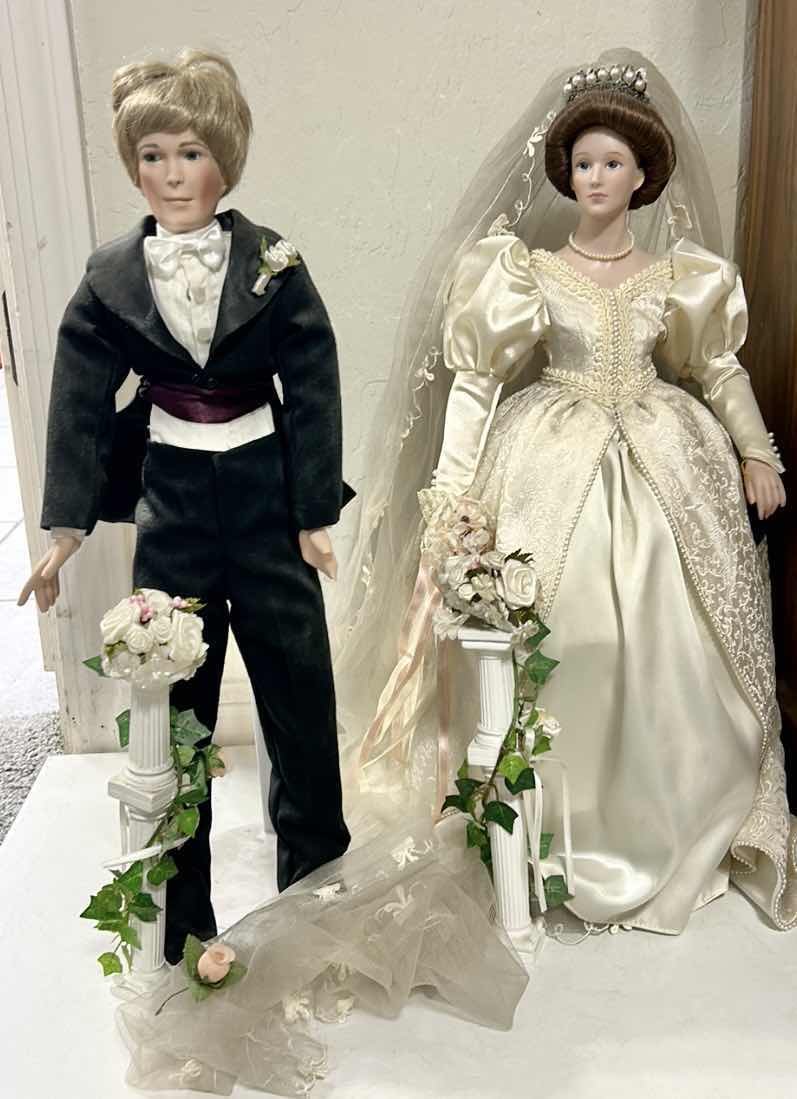 Photo 1 of PORCELAIN BRIDE AND GROOM DOLLS 18”