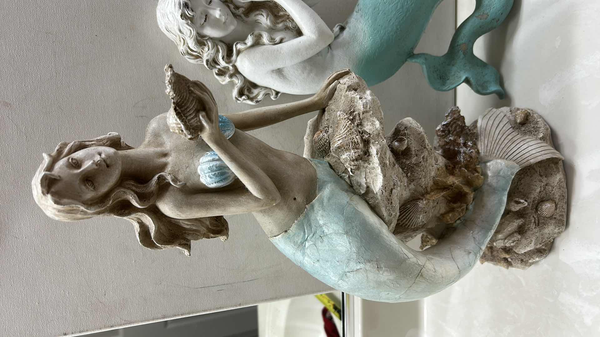 Photo 1 of TWO DECORATIVE MERMAID FIGURINES (TALLEST 18”)