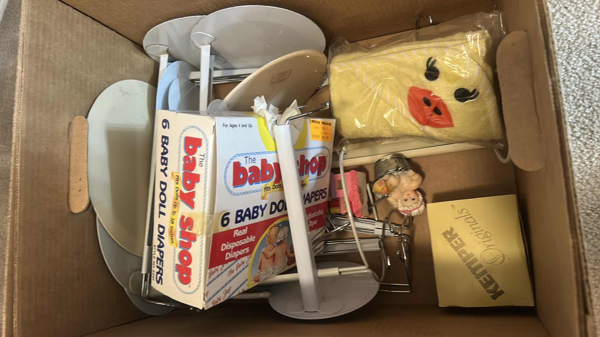 Photo 1 of BOX OF DOLL CLOTHES, AND DOLL STANDS