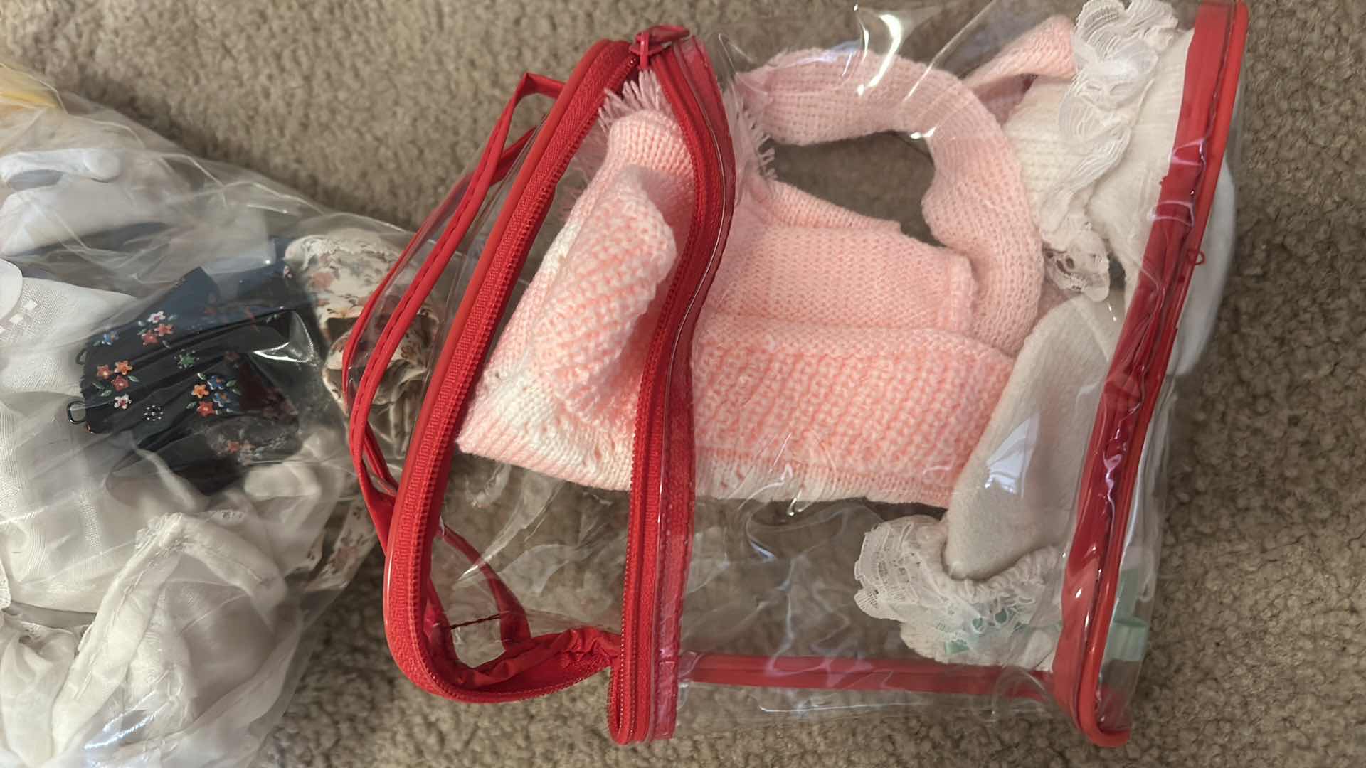Photo 1 of BOX OF DOLL CLOTHES, AND DOLL STANDS