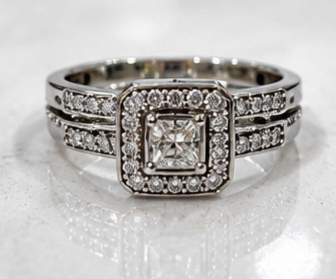Photo 1 of 10K WHITE GOLD DIAMOND RING
0.50 CTW 2.9G (EST SIZE 5-6) #51 $2,100