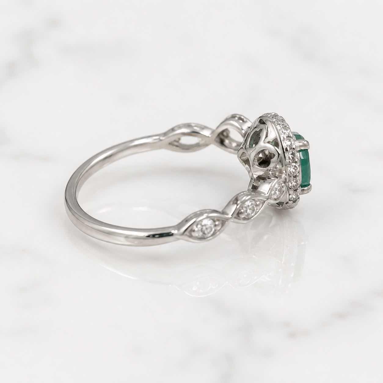 Photo 1 of 10K WHITE GOLD 0.50 CTW DIAMOND W 1CTW EMERALD, RING 2.3G (EST SIZE 6–7) #18 $1,575