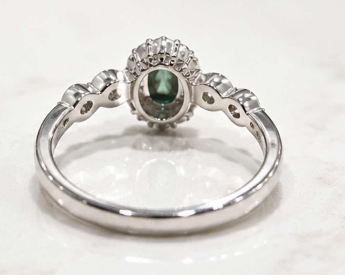 Photo 1 of 10K WHITE GOLD 0.50 CTW DIAMOND W 1CTW EMERALD, RING 2.3G (EST SIZE 6–7) #18 $1,575