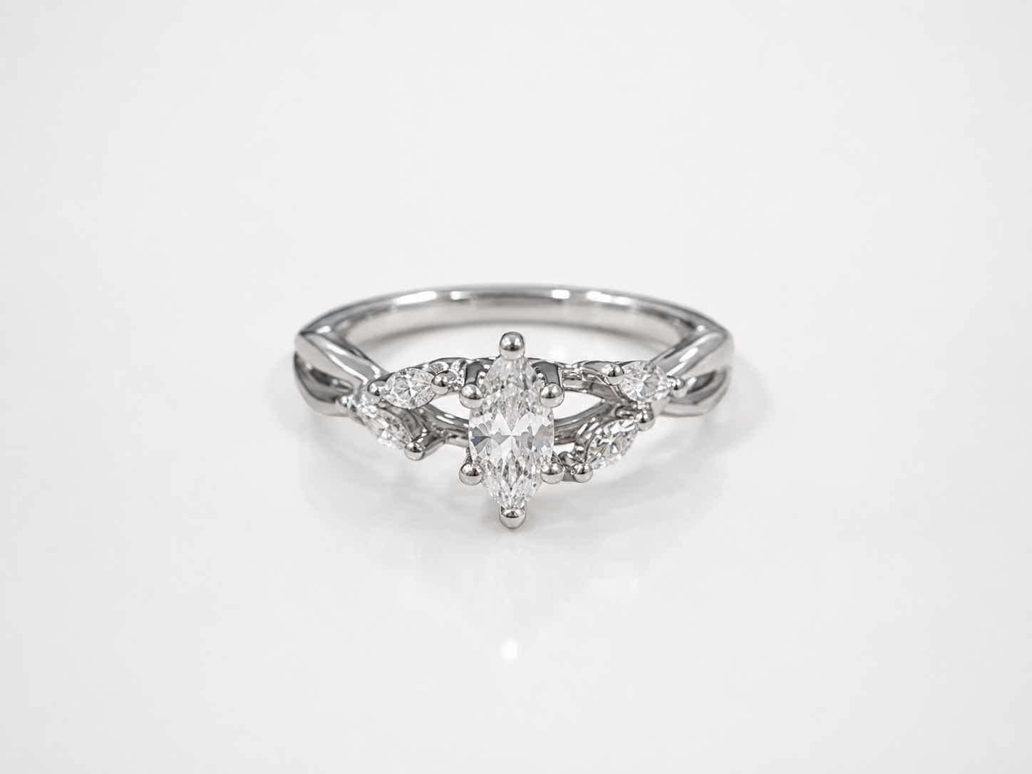 Photo 1 of 14K WHITE GOLD .50 CTW MARQUEE DIAMOND AND 0.20 CTW DIAMONDS ON SIDE RING 5G. (EST SIZE 6–7) #26 $3950.