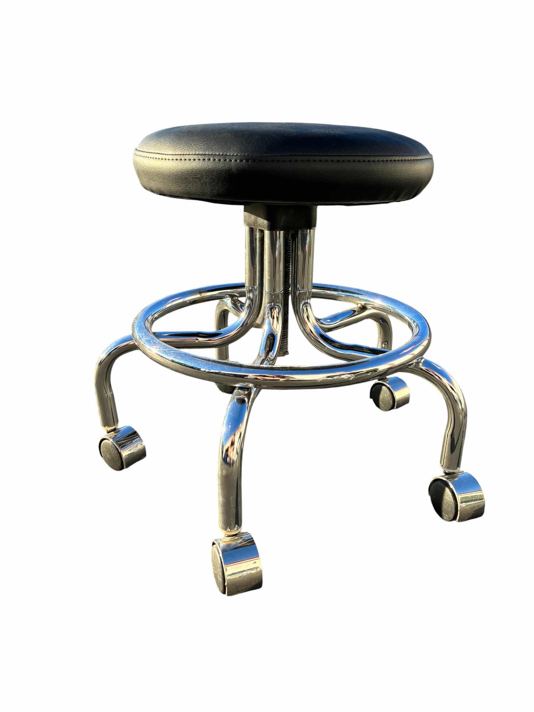Photo 1 of BLACK LEATHER STAINLESS STEEL ROLLING STOOL W FOOT REST
