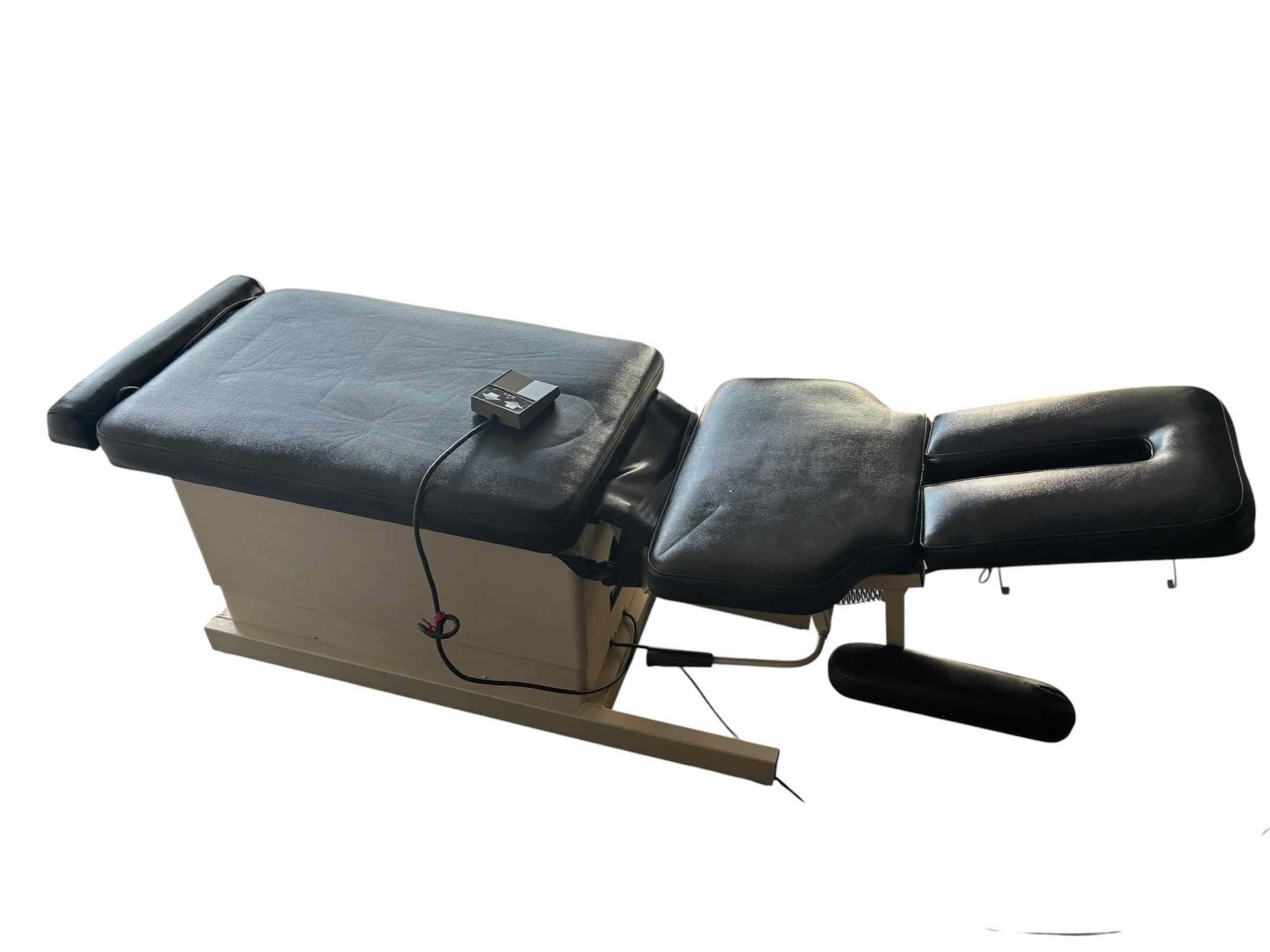 Photo 1 of HILL LABORATORIES EXTEND-R CHIROPRACTIC TABLE W CONTROLLER MODEL 2000