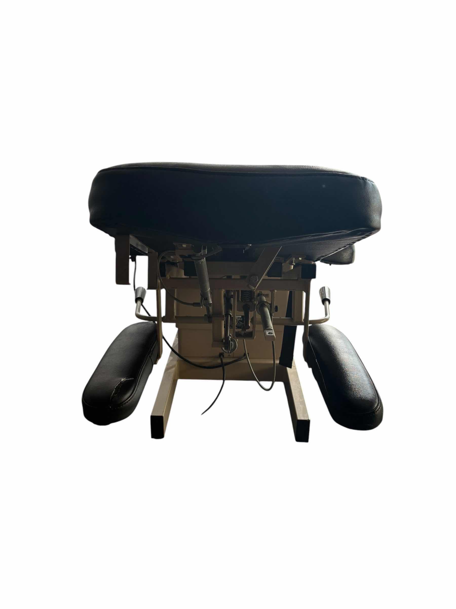 Photo 1 of HILL LABORATORIES EXTEND-R CHIROPRACTIC TABLE W CONTROLLER MODEL 2000