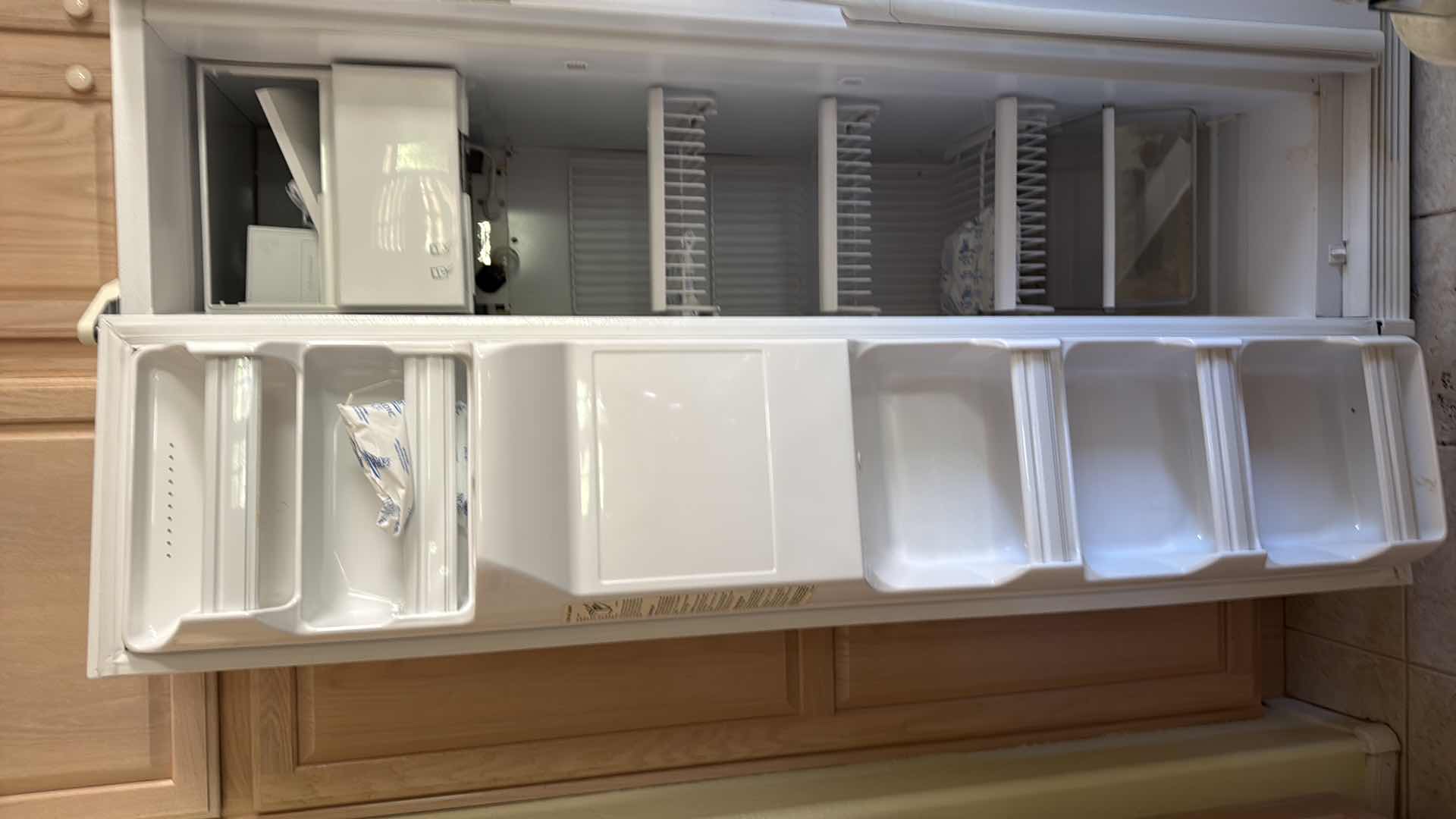 Photo 1 of WHITE GE PROFILE PERFORMANCE SIDE-BY-SIDE REFRIGERATOR