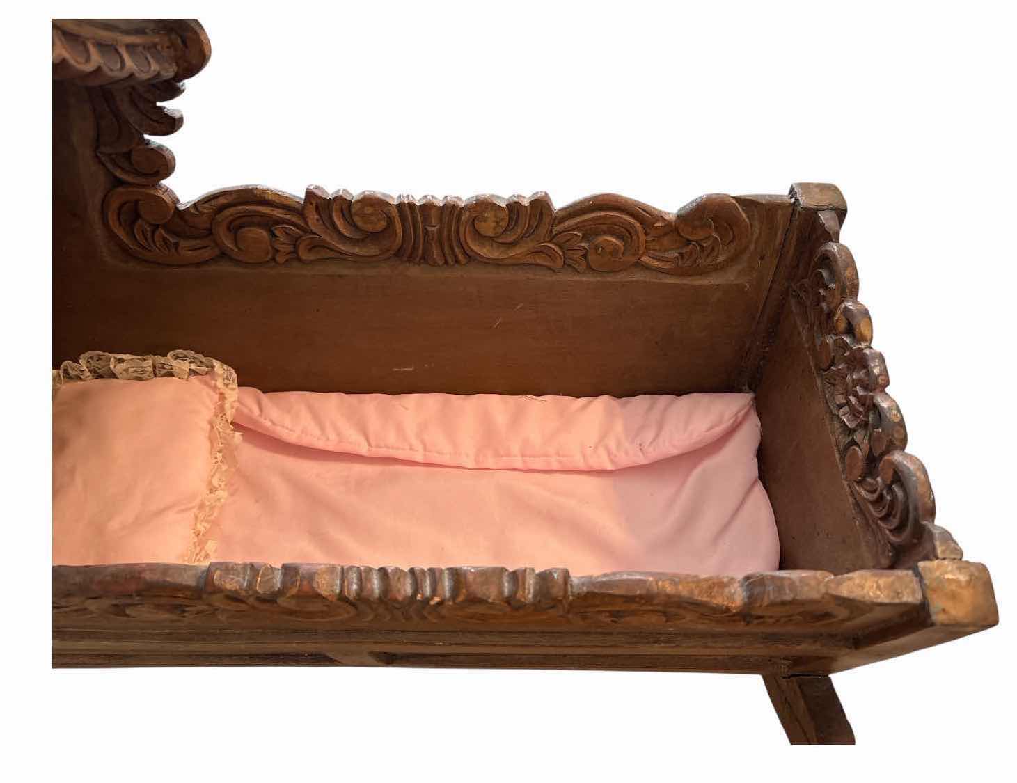 Photo 1 of VINTAGE HAND-PAINTED WOODEN ROCKING DOLL CRADLE W/CARVED DETAILS AND FLORAL ACCENTS 23”X17.5”H16” $300