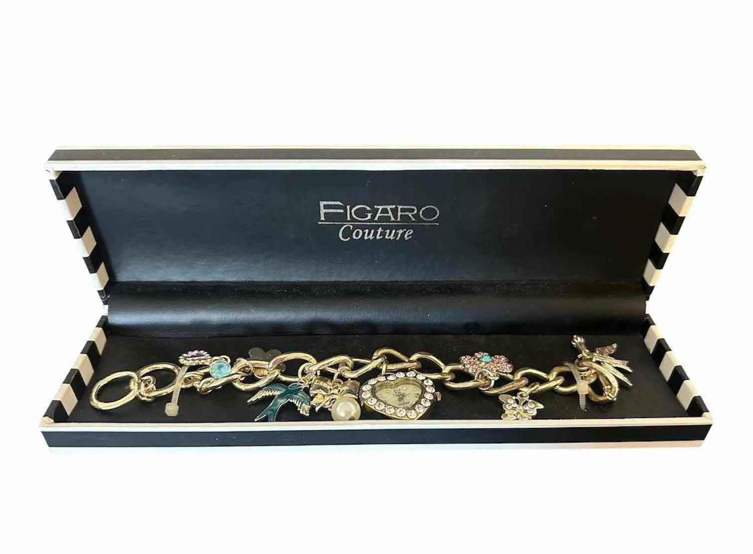 View 1 of FIGARO COUTURE CHARM BRACELET FEATURING A CENTRAL HEART SHAPED WATCH CHARM IN ORIGINAL BOX