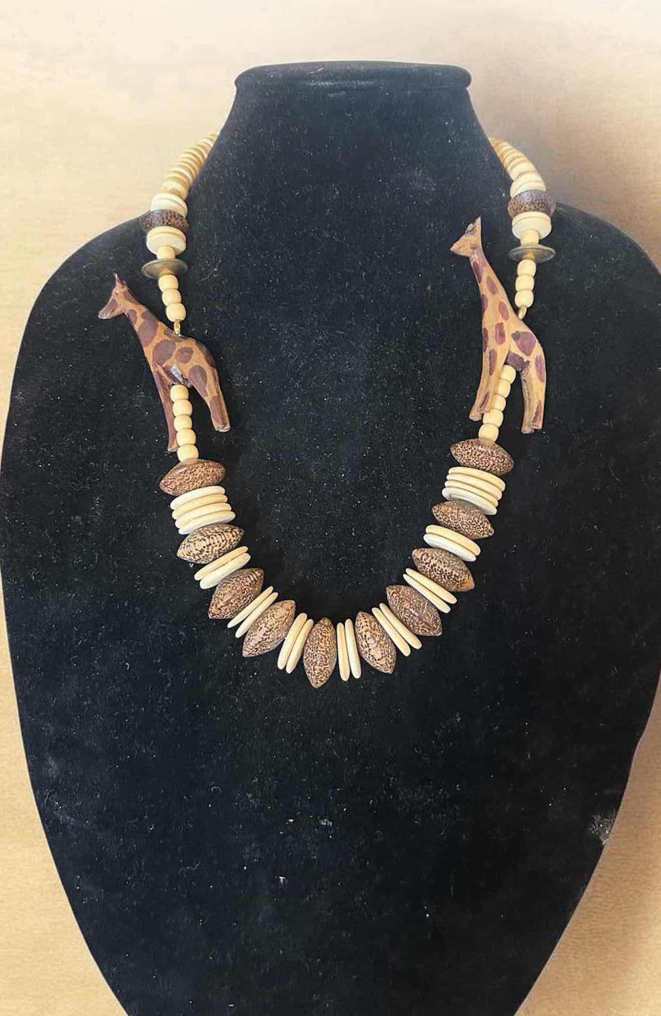 Photo 1 of HANDMADE VINTAGE NECKLACE W CARVED WOODEN GIRAFFE PENDANTS AND ETHNIC BEADS