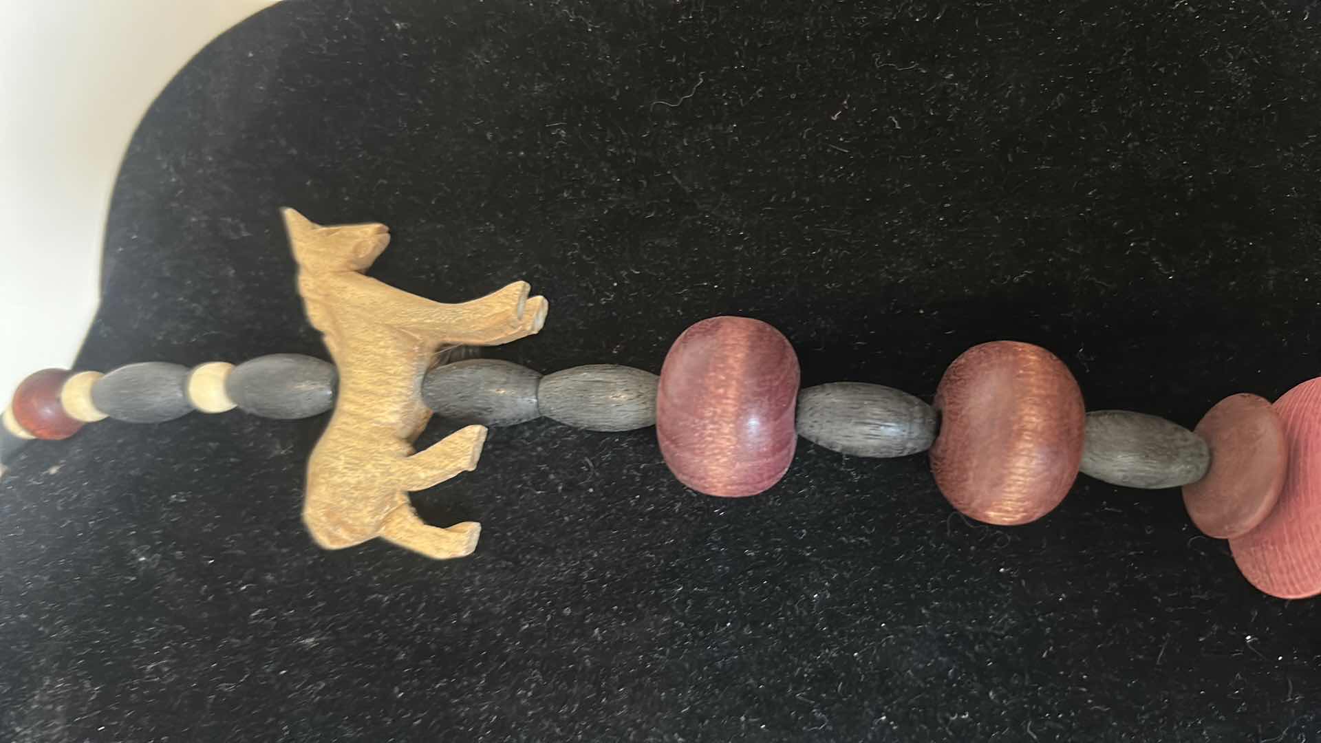 Photo 1 of VINTAGE STYLE HANDCRAFTED STATEMENT NECKLACE W CARVED WOODEN HORSE FIGURES AND PINK BLACK WOODEN BEADS