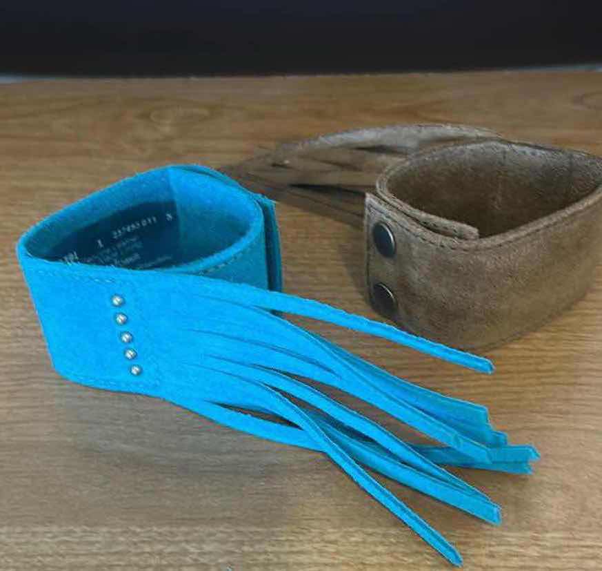 Photo 1 of 2- MINNETONKA TURQUOISE AND BROWN LEATHER FRINGE CUFFS $100
