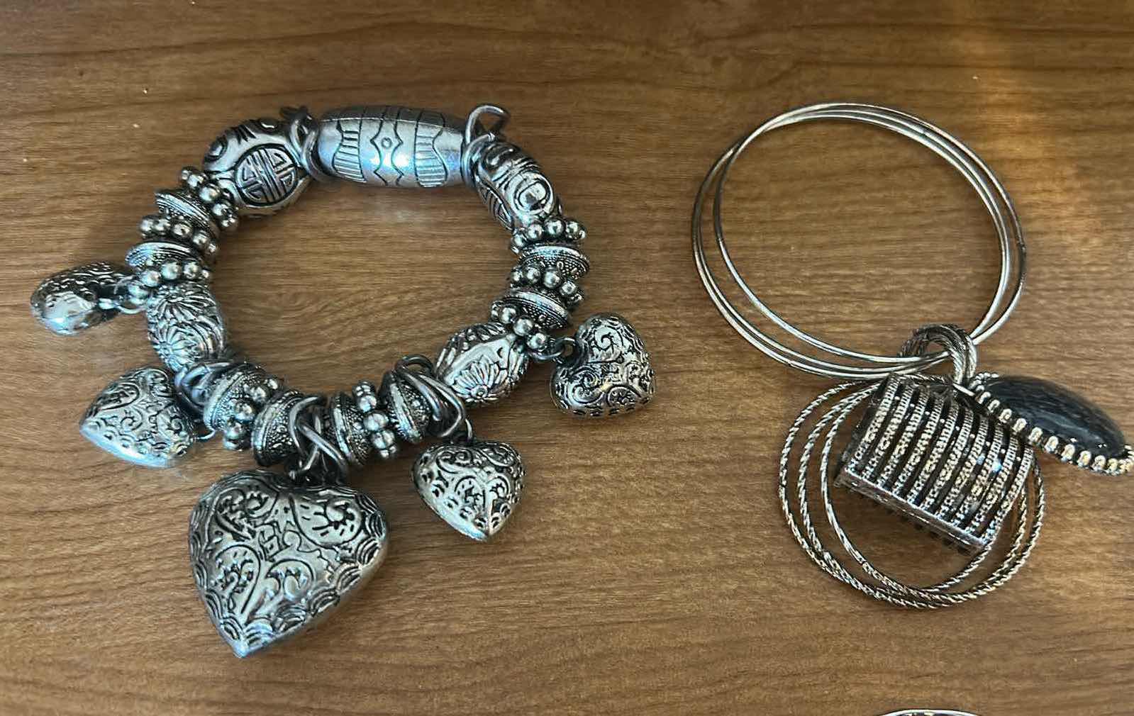 Photo 1 of 5- SILVER TONE BRACELETS AND METAL BANGLES