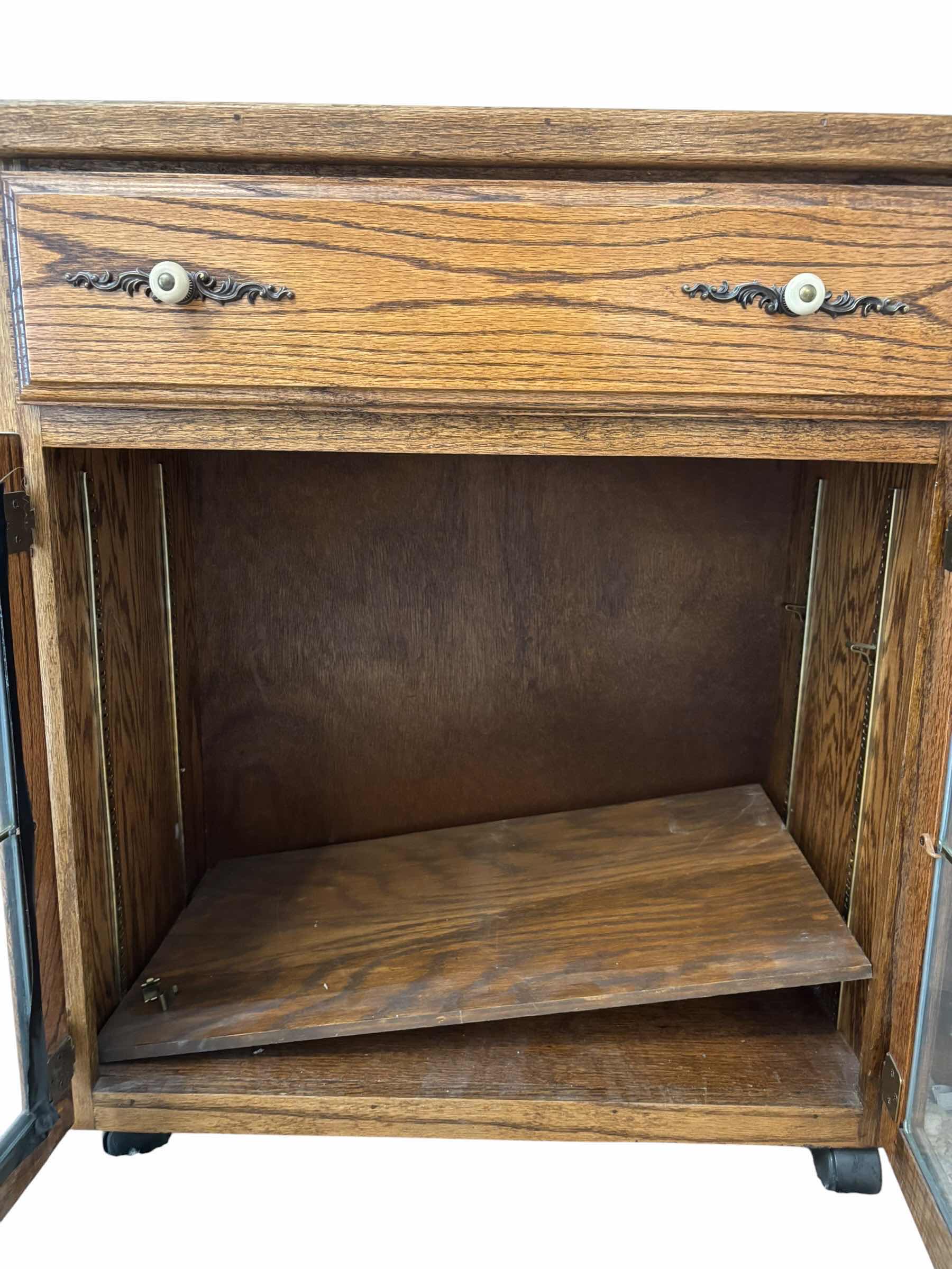 Photo 1 of VINTAGE SOLID OAK BAR CART $260