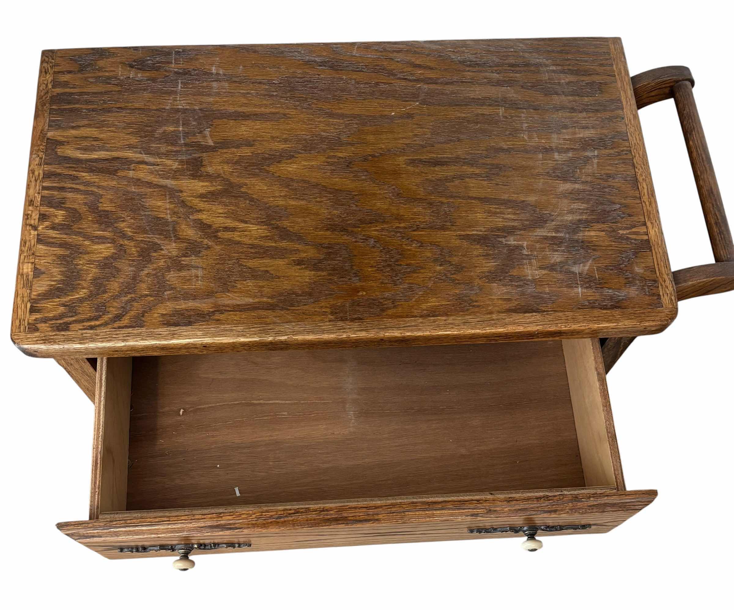 Photo 1 of VINTAGE SOLID OAK BAR CART $260