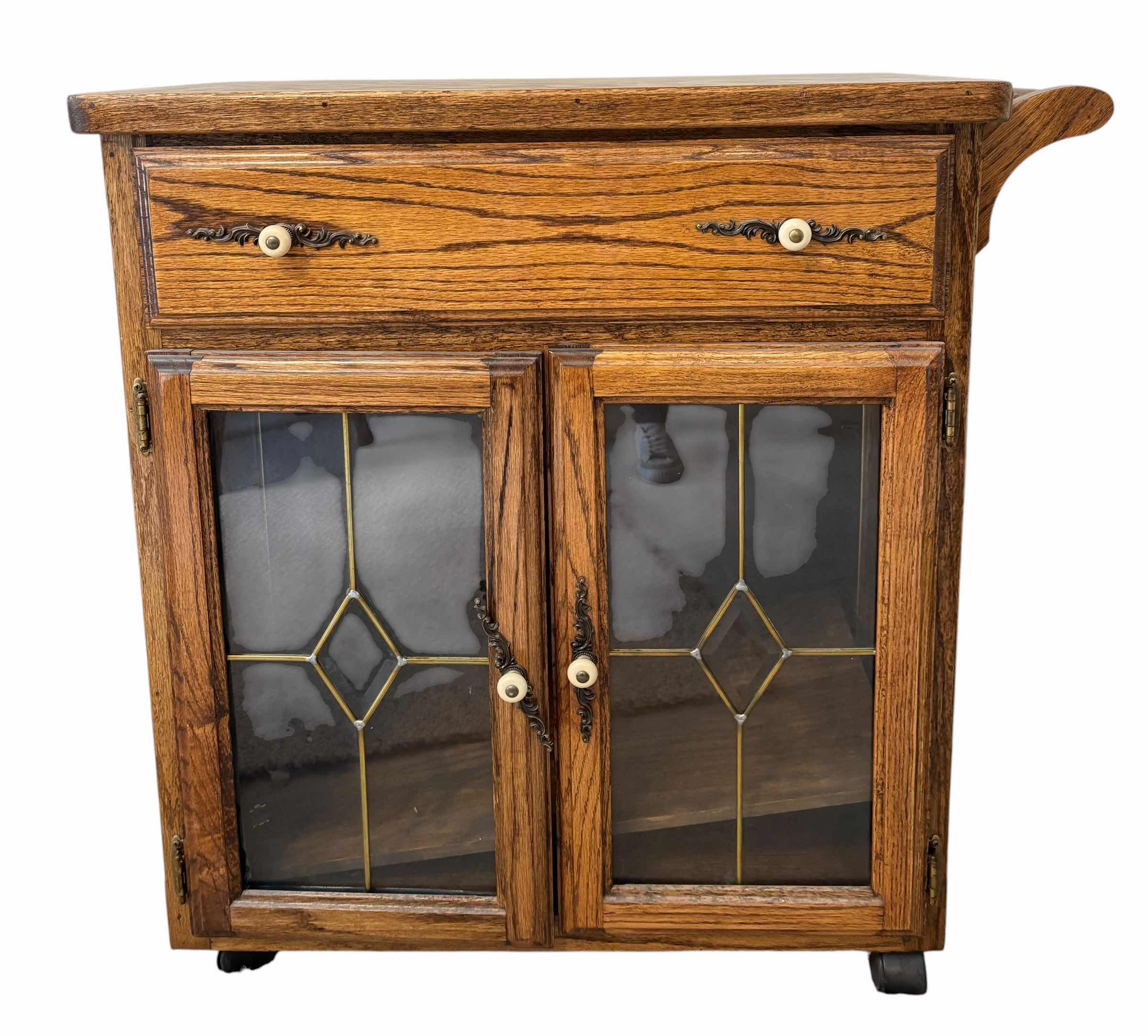 Photo 1 of VINTAGE SOLID OAK BAR CART $260