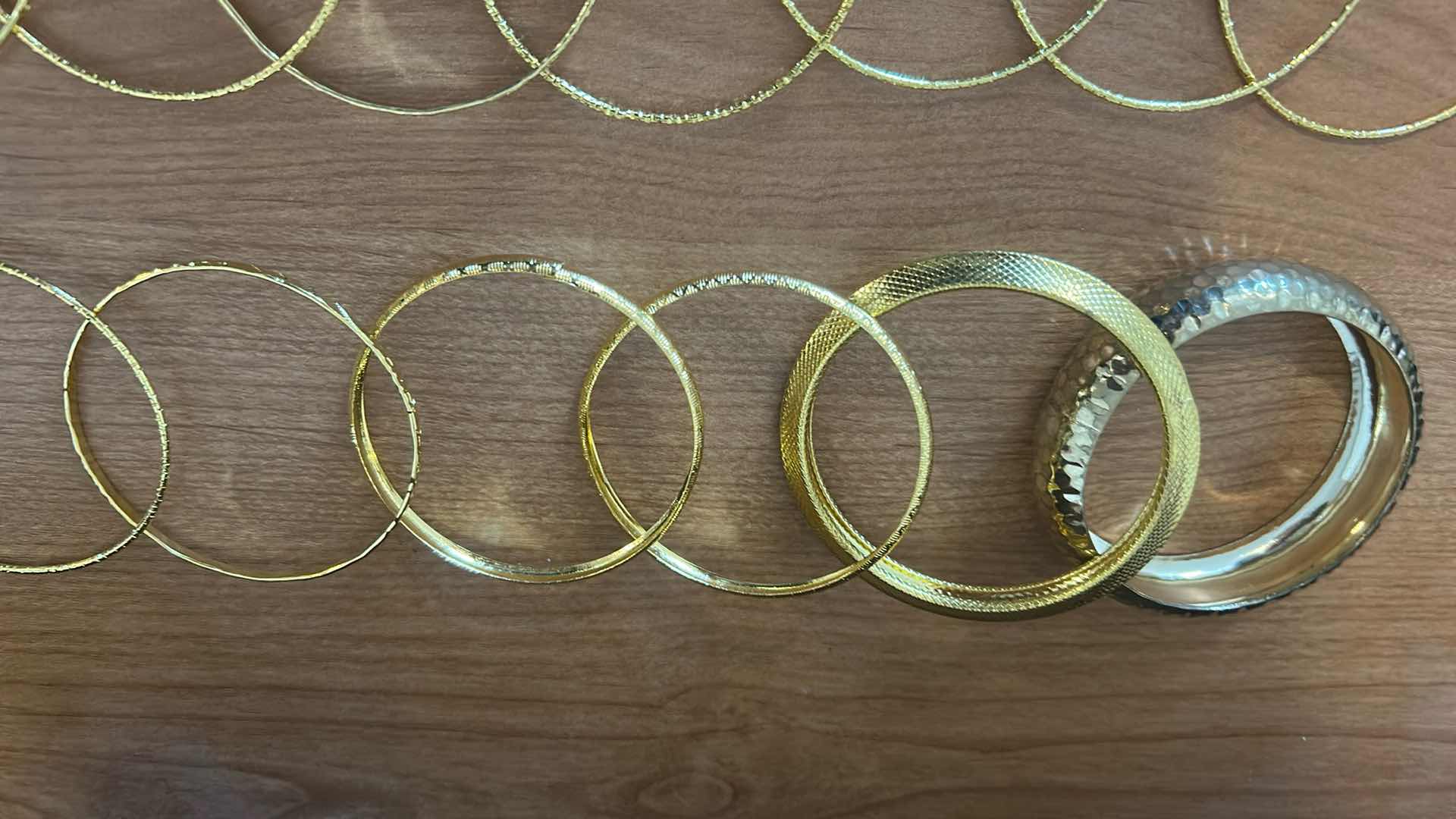 Photo 1 of 13- ASSORTMENT OF GOLD TONE BANGLES