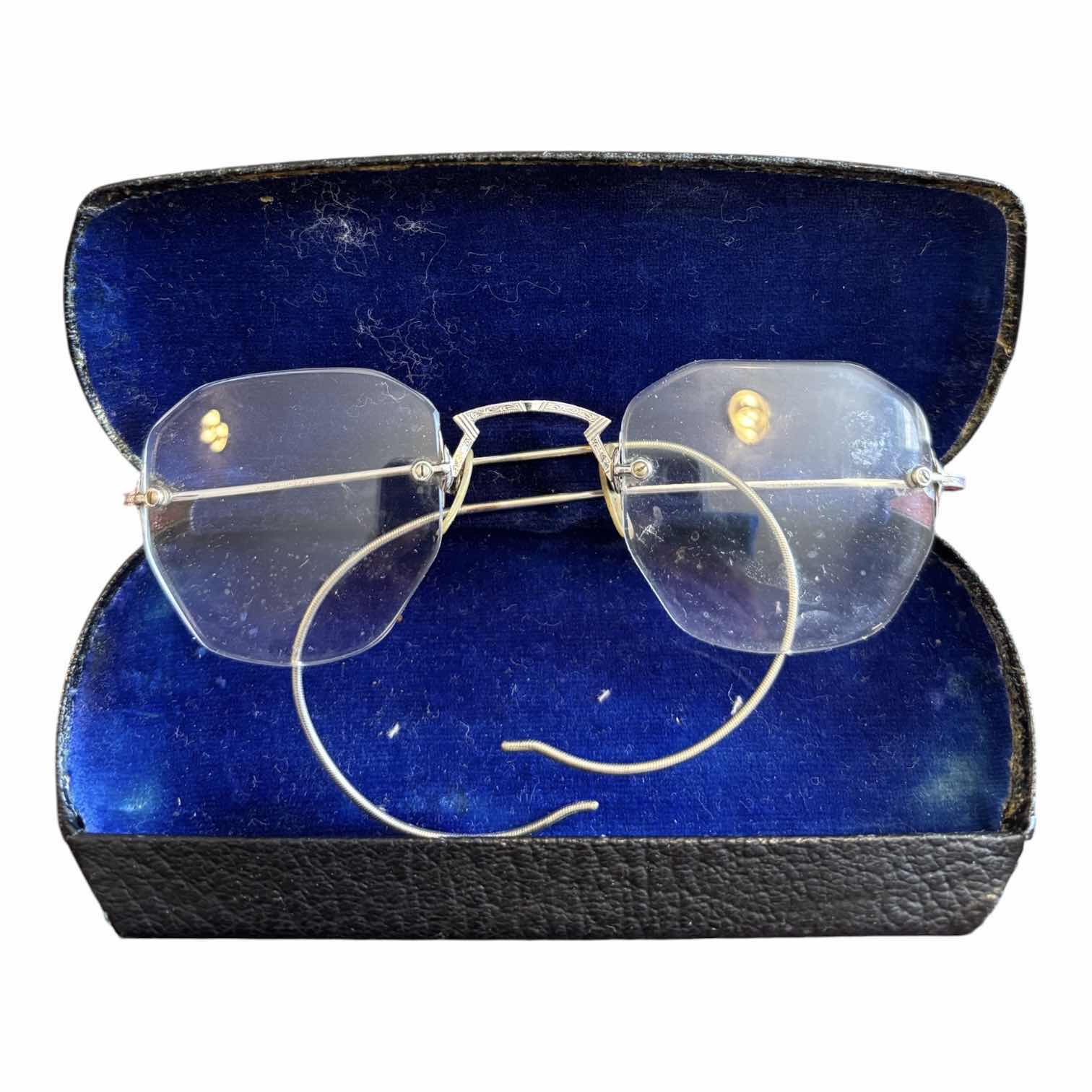 Photo 1 of VINTAGE 12K GOLD RIMLESS GLASSES $65