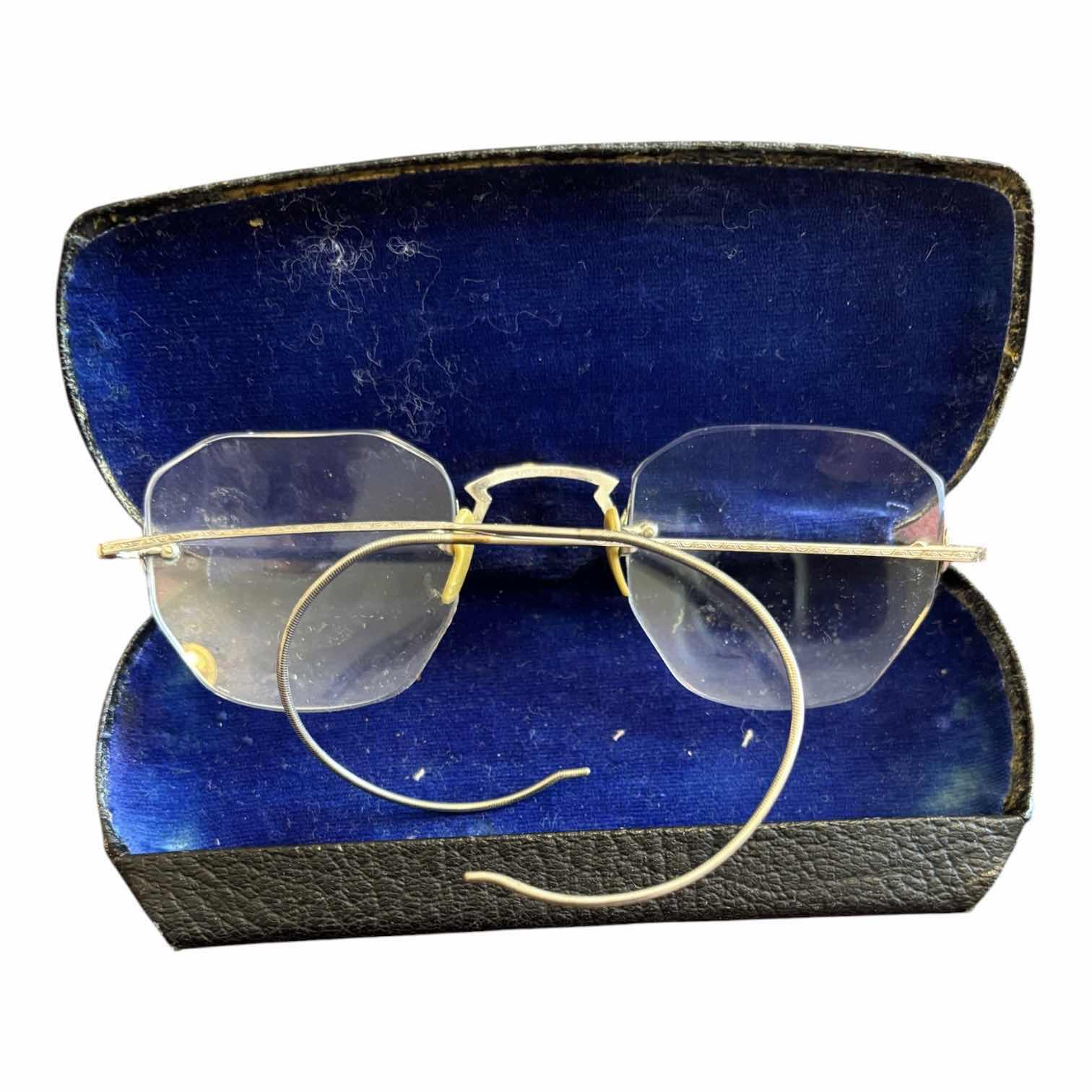 Photo 1 of VINTAGE 12K GOLD RIMLESS GLASSES $65