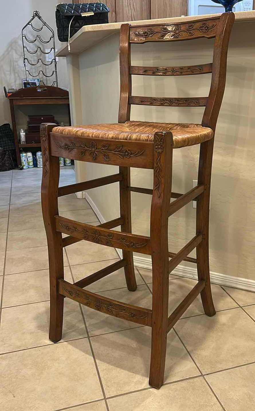 Photo 1 of FRENCH COUNTRY STYLE WOODEN BARSTOOL WITH LADDER BACK FLORAL CARVINGS & HAND WOVEN RUSH SEAT, SEAT HEIGHT 29” OVERALL HEIGHT 41 1/2”