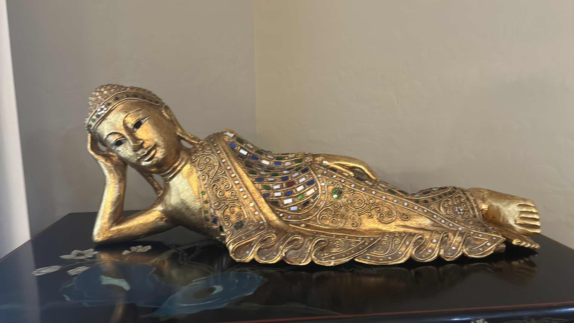 View 2 of HAND CARVED WOODEN RECLINING BUDDHA SCULPTURE,GOLD GILT FINISH W INLAID MIRROR GLASS 26” x H9”