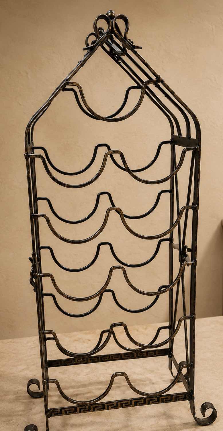 Photo 1 of BRONZE FINISH WROUGHT IRON FREESTANDING WINE RACK H32”