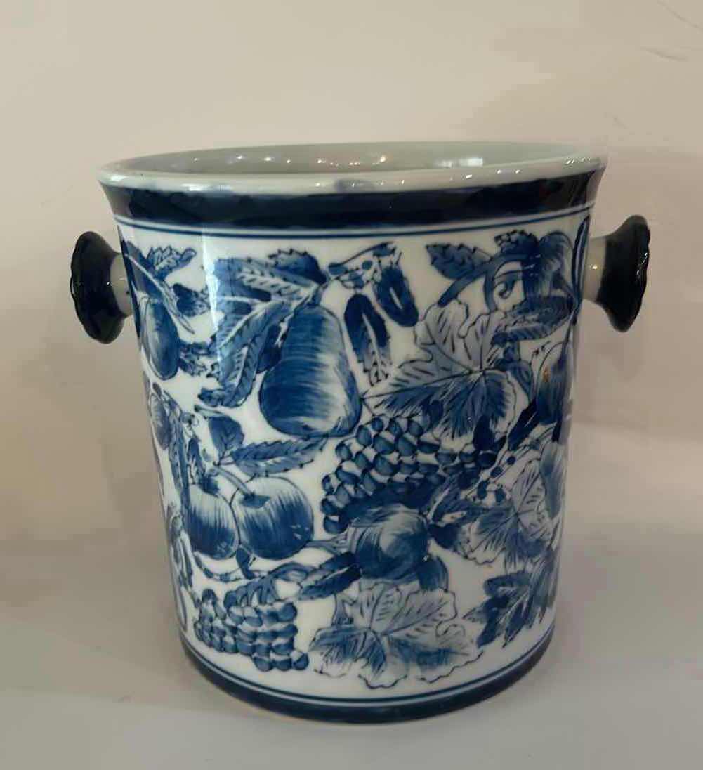 Photo 1 of THE ESTIMATED RESALE PRICE FOR THIS CENTRUM BLUE AND WHITE PORCELAIN BUCKET IS BETWEEN $35 AND $65. seven and three-quarter inches