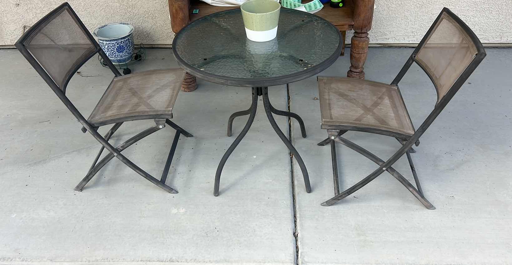 View 2 of METAL BISTRO TABLE WITH WAVY GLASS TOP AND TWO CHAIR CHAIRS.