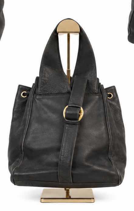 Photo 1 of VINTAGE PALOMA PICASSO BLACK LEATHER DRAWSTRING BACKPACK FEATURES A SLOUCHY BUCKET SILHOUETTE CRAFTED FROM GLOVE-SOFT SMOOTH BLACK LEATHER. EST VALUE $125 - $200