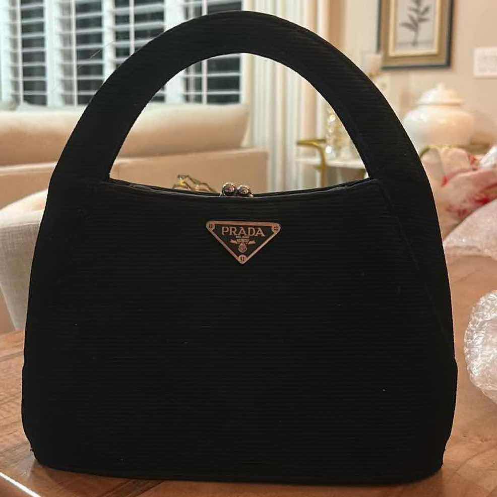 Photo 1 of IMITATION VINTAGE PRADA FEATURING A RIGID TOP HANDLE FRAME AND A KISS LOCK CLOSURE